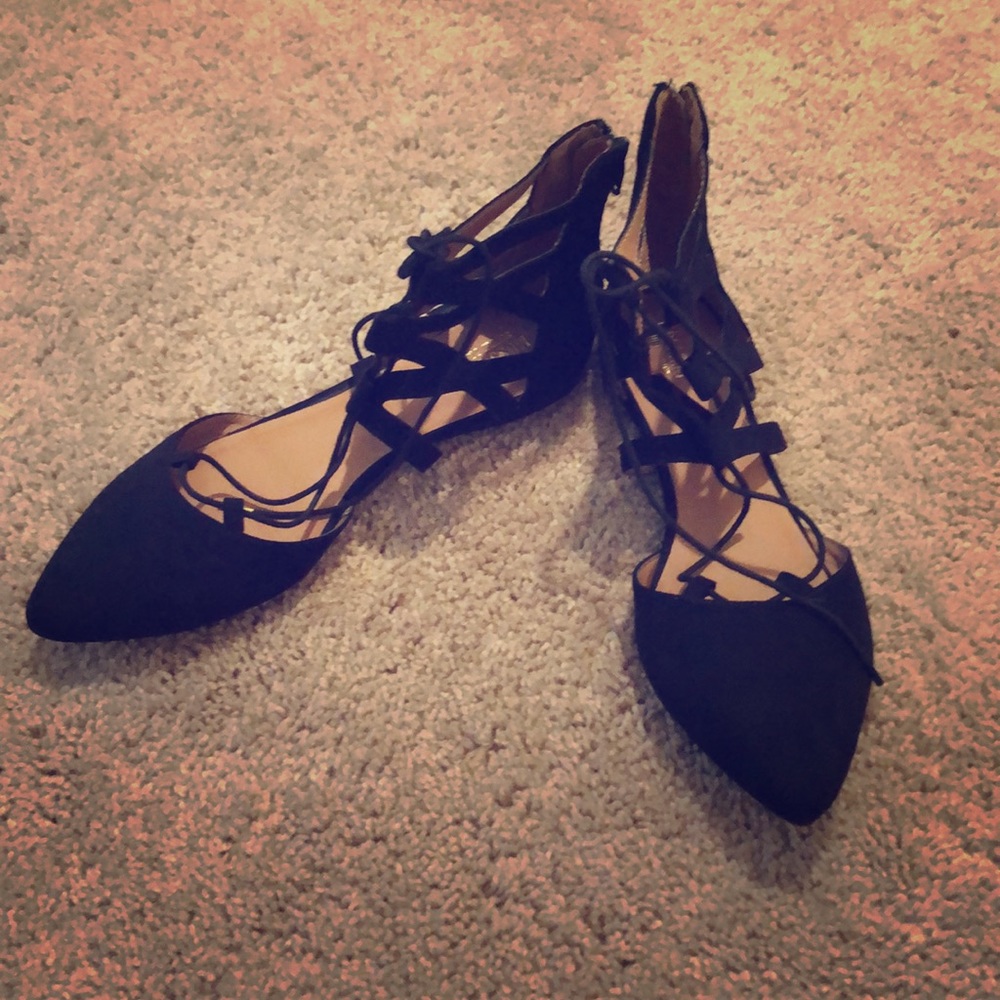 Pointed toe zip up flats